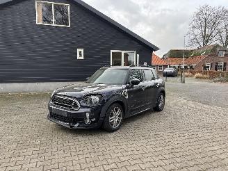 Vaurioauto  passenger cars Mini Cooper COUNTRYMAN HYBRIDE PLUG IN SE 4AWD AUTOMAAT NAVI CLIMA LEER LED PDC B.J 2019 2019/7