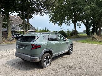 Dacia Duster AUTOMAAT 1.6 HYBRIDE NAVI CLIMA CAMERA PDC LED B.J 12-2024 picture 2