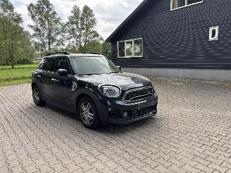 damaged passenger cars Mini Countryman COOPER SPORT HYBRIDE PLUG IN SE 4AWD AUTOMAAT NAVI CLIMA LEER LED PDC STOELVERW B.J 12-2019 2019/12