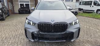 skadebil auto BMW X5 50e 2025/10