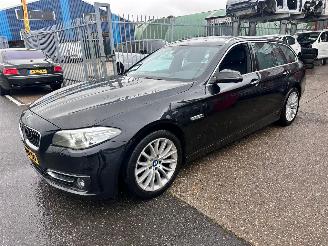 Voiture accidenté BMW 5-serie TOURING 520i Luxury Edition 2014/5