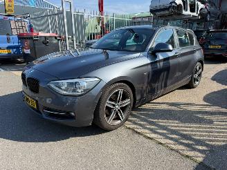 uszkodzony samochody osobowe BMW 1-serie 116D EDE HIGH EXECUTIVE 2014/1