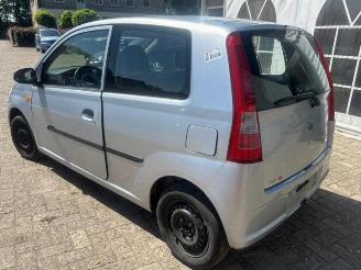 Daihatsu Cuore Cuore (L251/271/276), Hatchback, 2003 1.0 12V DVVT picture 5