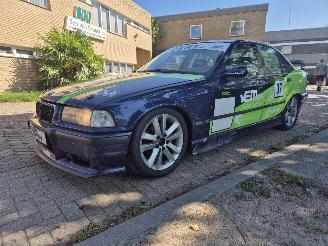 Damaged car BMW 3-serie 328i 6-cilinder race edition 1990/4