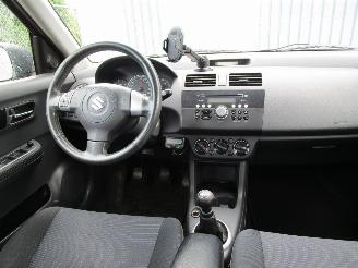 Suzuki Swift 1.3 Airco Radio/CD Parelmoer Wit picture 11